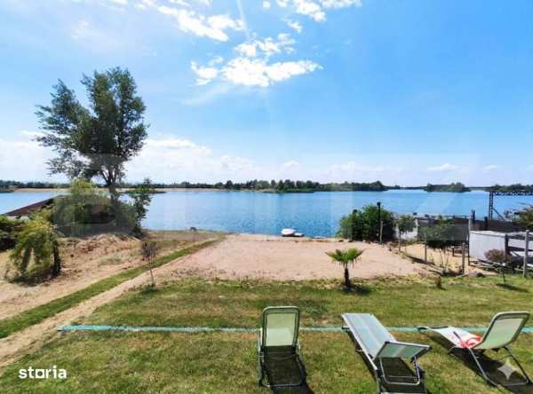 Teren pentru casa de vacanta cu plaja, 1150 mp, zona Apa