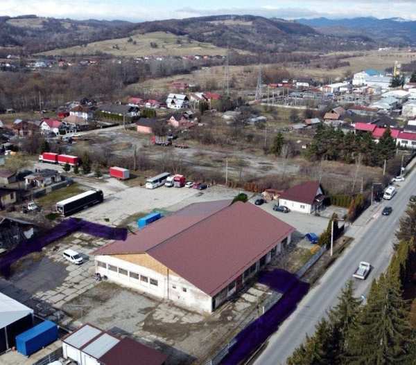 Teren  intravilan 2.099 mp + o hala cu suprafata de 516 mp