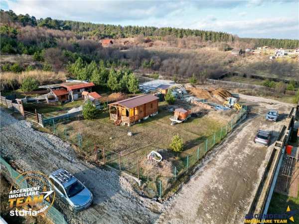 Teren intravilan 520 mp cu casuta din lemn,zona linistita,aproape de o