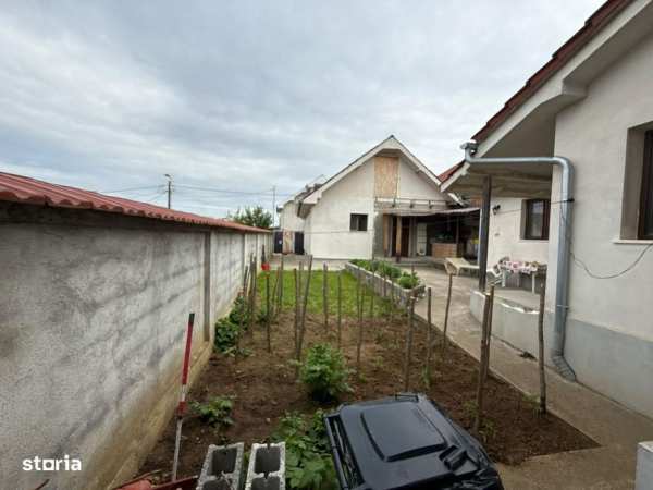 2 case/1 casa noua , 1 casa  renovata ,teren 500mp, case familiare