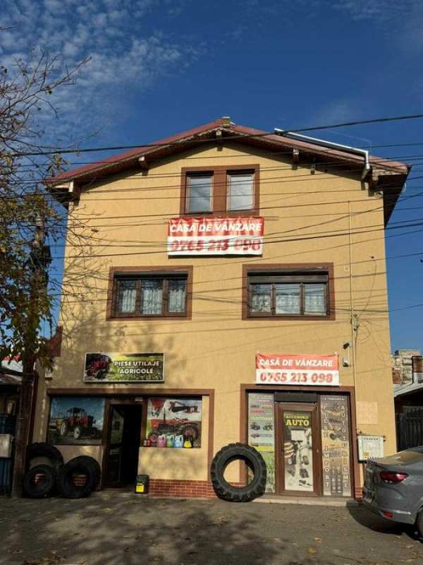 Casă de vânzare + 2 spații comerciale funcționale + foișor inchis