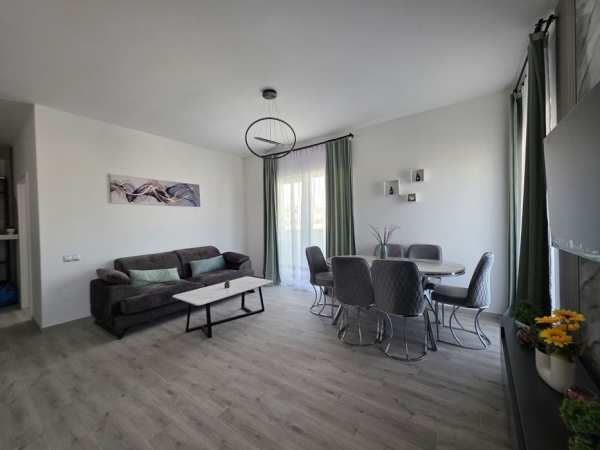 Apartament cu parcare subterană de închiriat