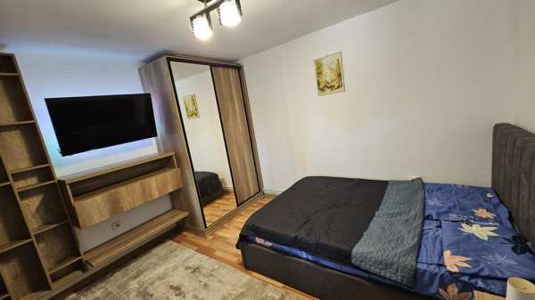 Inchiriez garsoniera langa Targu Jiu la parter cu gradina