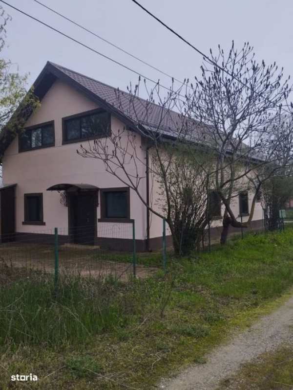SE VINDE CASA IN CALUGARENI 5 camere, teren 600mp