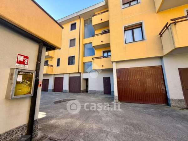 Box/posto auto in residenziale in Via Rho 21