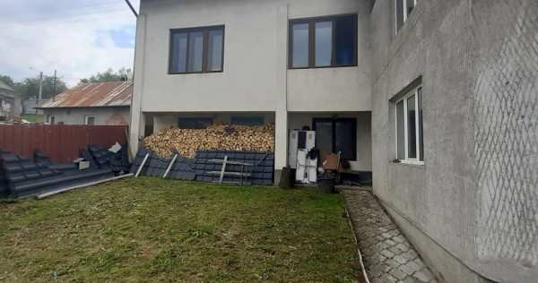 Baia sprie, casa caramida