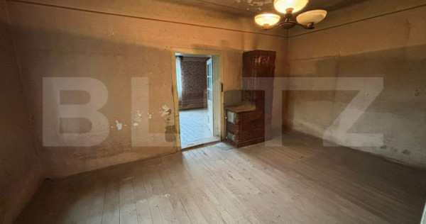 Casa de vanzare cu 3 camere.