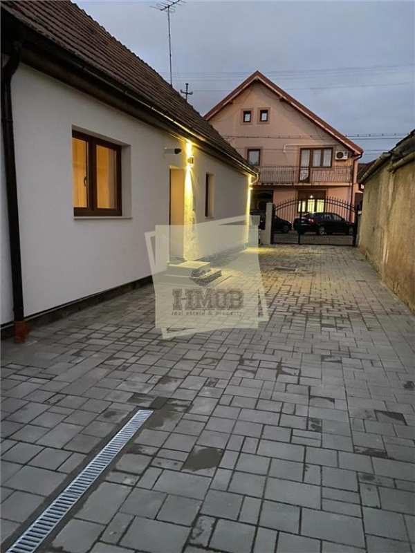 Casa moderna 80 mp 2 camere baie garaj 29mp curte 120 mp lazaret